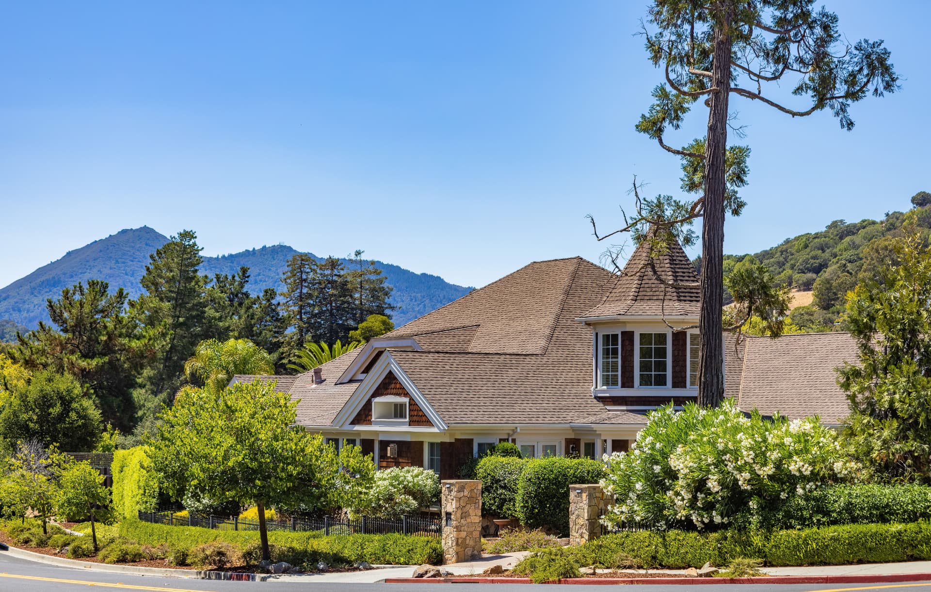 Marin County home on a green hillside below Mount Tamalpais